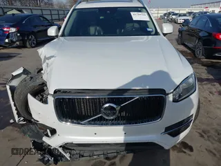 2016 Volvo XC90 Momentum with VIN YV4102XK4G1059299, listed as a IAAI auction lot 41749794 with 76,439 mi miles and . Bid and sale history available at DreamBid. Image 13.
