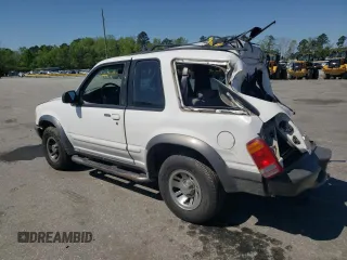 1998 Ford Explorer Sport с VIN 1FMYU22X0WUC49831, выставлен на аукционе Copart как лот 52305105 с пробегом 179 547 миль миль и Списание • Salvage title. История ставок и продаж доступна на DreamBid. Изображение 2.