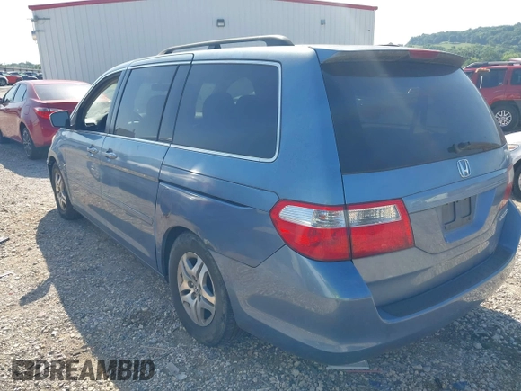 2005 Honda Odyssey EX with VIN 5FNRL38465B059893, listed as a IAAI auction lot 42790058 with 257,143 mi miles and . Bid and sale history available at DreamBid. Image 3.
