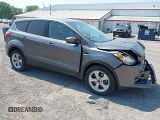2014 Ford Escape SE z VIN 1FMCU9GXXEUE08655, wystawiony jako IAAI lot #42469634 z przebiegiem 163 054 mil mil oraz . Historia ofert i sprzedaży dostępna na DreamBid. Obrazek 1.