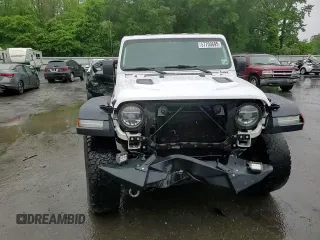 2019 Jeep Wrangler Unlimited Rubicon with VIN 1C4HJXFG8KW678265, listed as a Copart auction lot 57700695 with 120,950 mi miles and Salvage title. Bid and sale history available at DreamBid. Image 14.
