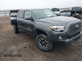 2022 Toyota Tacoma SR z VIN 3TMCZ5AN4NM476170, wystawiony jako IAAI lot #41482149 z przebiegiem 57 126 mil mil oraz . Historia ofert i sprzedaży dostępna na DreamBid. Obrazek 1.