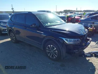 2022 Volkswagen Tiguan S z VIN 3VV1B7AX7NM107779, wystawiony jako IAAI lot #41210258 z przebiegiem 57 154 mil mil oraz . Historia ofert i sprzedaży dostępna na DreamBid. Obrazek 1.