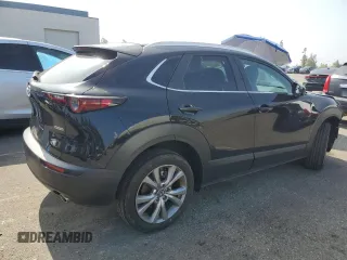 2023 Mazda CX-30 S Select with VIN 3MVDMBBM7PM582394, listed as a Copart auction lot 59786415 with Not provided miles and Salvage title. Bid and sale history available at DreamBid. Image 3.