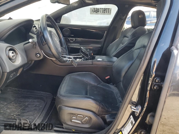 2015 Jaguar XJ with VIN SAJWJ1CD1F8V90815, listed as a Copart auction lot 77977464 with Not provided miles and Salvage title. Bid and sale history available at DreamBid. Image 7.