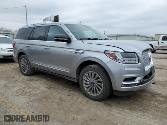 2020 Lincoln Navigator with VIN 5LMJJ2NT0LEL09760, listed as a Copart auction lot 86628254 with 118,733 mi miles and Salvage title. Bid and sale history available at DreamBid. Image 4.