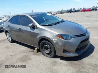 2019 Toyota Corolla L z VIN 5YFBURHE5KP932012, wystawiony jako IAAI lot #42236241 z przebiegiem 96 640 mil mil oraz . Historia ofert i sprzedaży dostępna na DreamBid. Obrazek 1.
