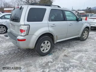 2008 Mercury Mariner with VIN 4M2CU81Z98KJ46467, listed as a IAAI auction lot 41303575 with 207,949 mi miles. Bid and sale history available at carsss.com. Image 4.