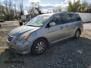 2010 Honda Odyssey EX-L with VIN 5FNRL3H78AB030903, listed as a Copart auction lot 52911705 with 200,499 mi miles and Salvage Title. Bid and sale history available at carsss.com. Image 1.