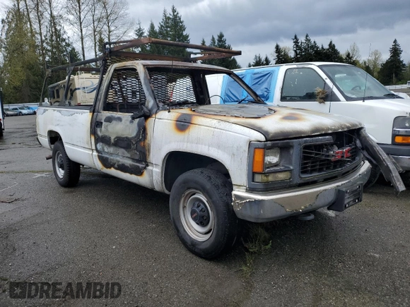 2000 GMC Sierra 1500 with VIN 1GTGC34R2YR191556, listed as a Copart auction lot 52346615 with Not Provided miles and Salvage Title. Bid and sale history available at DreamBid. Image 4.