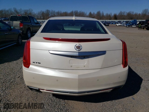 2013 Cadillac XTS Premium z VIN 2G61S5S34D9201773, wystawiony jako Copart lot #48572365 z przebiegiem 78 296 mil mil oraz Szkoda całkowita • Salvage title. Historia ofert i sprzedaży dostępna na DreamBid. Obrazek 6.