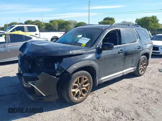 2023 Honda Pilot Elite with VIN 5FNYG1H87PB045057, listed as a IAAI auction lot 41748553 with 44,329 mi miles and . Bid and sale history available at DreamBid. Image 18.