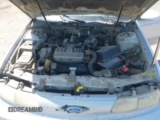 1994 Ford Taurus GL z VIN 1FALP5242RG144553, wystawiony jako IAAI lot #42084759 z przebiegiem 45 059 mil mil oraz . Historia ofert i sprzedaży dostępna na DreamBid. Obrazek 10.