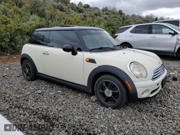 2007 MINI Hardtop with VIN WMWMF33567TT56922, listed as a Copart auction lot 56598665 with 66,605 mi miles and Salvage title. Bid and sale history available at DreamBid. Image 4.