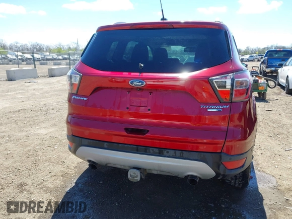 2017 Ford Escape Titanium with VIN 1FMCU9J96HUA68094, listed as a IAAI auction lot 42043893 with 85,893 mi miles. Bid and sale history available at carsss.com. Image 15.