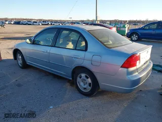 2003 Honda Civic Hybrid with VIN JHMES956X3S019115, listed as a IAAI auction lot 41214960 with 303,472 mi miles. Bid and sale history available at carsss.com. Image 3.