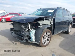 2021 Volkswagen Atlas SE z VIN 1V2HR2CA0MC543876, wystawiony jako IAAI lot #41598298 z przebiegiem 99 171 mil mil oraz . Historia ofert i sprzedaży dostępna na DreamBid. Obrazek 18.