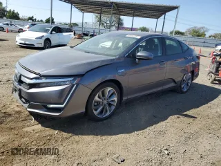 2019 Honda Clarity Plug-In Hybrid Touring with VIN JHMZC5F31KC003180, listed as a Copart auction lot 56952284 with 57,249 mi miles and Salvage Title. Bid and sale history available at carsss.com. Image 1.