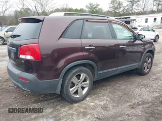 2012 Kia Sorento EX with VIN 5XYKU3A63CG219812, listed as a IAAI auction lot 41452705 with 247,584 mi miles. Bid and sale history available at carsss.com. Image 4.