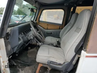 1993 Jeep Wrangler z VIN 1J4FY29S6PP245917, wystawiony jako Copart lot #58805235 z przebiegiem 162 170 mil mil oraz Czysty tytuł • Clean title. Historia ofert i sprzedaży dostępna na DreamBid. Obrazek 7.