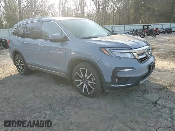 2022 Honda Pilot Touring 7-Passenger with VIN 5FNYF5H69NB031537, listed as a Copart auction lot 48986685 with 88,301 mi miles and Salvage title. Bid and sale history available at DreamBid. Image 12.