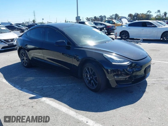 2019 Tesla Model 3 Mid Range z VIN 5YJ3E1EA5KF306816, wystawiony jako IAAI lot #41710916 z przebiegiem 76 222 mil mil oraz . Historia ofert i sprzedaży dostępna na DreamBid. Obrazek 1.