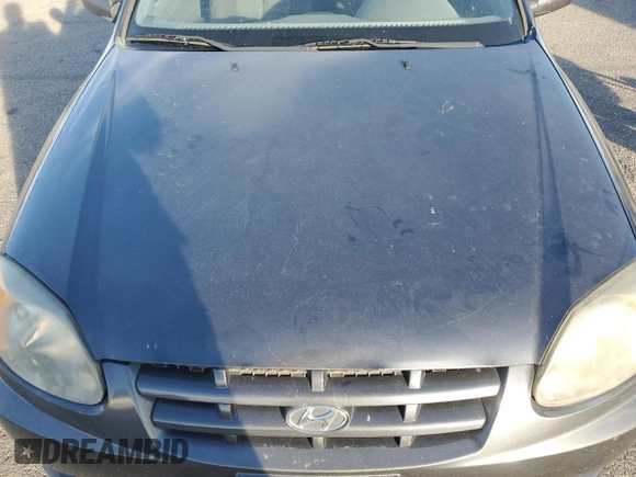 2005 Hyundai Accent GLS with VIN KMHCG35C65U359247, listed as a Copart auction lot 79305324 with 120,985 mi miles and Salvage Title. Bid and sale history available at carsss.com. Image 13.