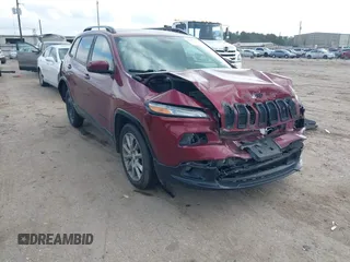 2018 Jeep Cherokee Latitude with VIN 1C4PJLCB0JD612140, listed as a IAAI auction lot 41517322 with 70,683 mi miles. Bid and sale history available at carsss.com. Image 1.