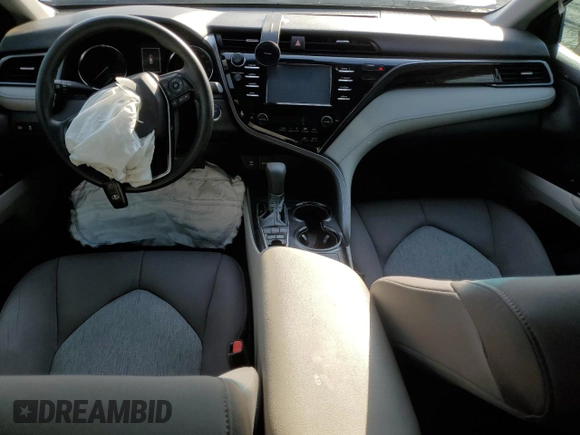 2019 Toyota Camry Hybrid LE z VIN 4T1B31HK9KU516943, wystawiony jako Copart lot #49047885 z przebiegiem 100 925 mil mil oraz Szkoda całkowita • Salvage title. Historia ofert i sprzedaży dostępna na DreamBid. Obrazek 8.