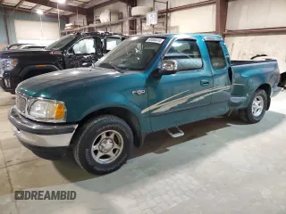 1997 Ford F-150 XL with VIN 1FTDX07W4VKC63367, listed as a Copart auction lot 68466414 with 97,122 mi miles and Salvage title. Bid and sale history available at DreamBid. Image 1.