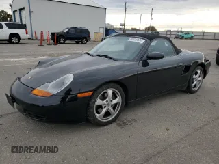 2002 Porsche Boxster z VIN WP0CA29872U624937, wystawiony jako Copart lot #80219174 z przebiegiem 88 272 mil mil oraz Szkoda całkowita • Salvage title. Historia ofert i sprzedaży dostępna na DreamBid. Obrazek 1.