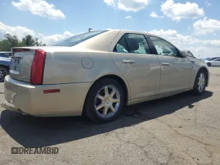 2009 Cadillac STS AWD z VIN 1G6DD67V390151523, wystawiony jako Copart lot #58758675 z przebiegiem Nie podano mil oraz Szkoda całkowita • Salvage title. Historia ofert i sprzedaży dostępna na DreamBid. Obrazek 3.