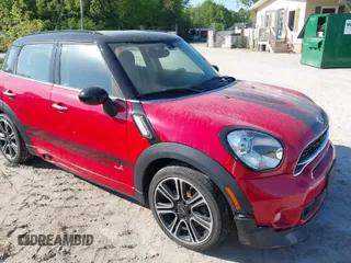 2016 MINI Countryman S with VIN WMWZC5C5XGWU03345, listed as a IAAI auction lot 42051820 with 88,039 mi miles and . Bid and sale history available at DreamBid. Image 1.