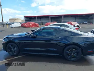 2021 Ford Mustang GT z VIN 1FA6P8CF1M5147740, wystawiony jako IAAI lot #38920487 z przebiegiem 15 299 mil mil oraz . Historia ofert i sprzedaży dostępna na DreamBid. Obrazek 14.