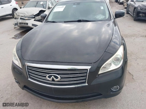 2013 Infiniti M37 with VIN JN1BY1AP0DM514046, listed as a IAAI auction lot 42031499 with 219,726 mi miles. Bid and sale history available at carsss.com. Image 6.
