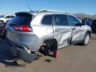 2018 Jeep Cherokee Latitude Tech Connect with VIN 1C4PJMCB7JD501896, listed as a IAAI auction lot 41872851 with 99,165 mi miles. Bid and sale history available at carsss.com. Image 4.