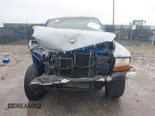 1998 Dodge Dakota SLT z VIN 1B7GG22YXWS683170, wystawiony jako IAAI lot #41903787 z przebiegiem Nie podano mil oraz . Historia ofert i sprzedaży dostępna na DreamBid. Obrazek 12.