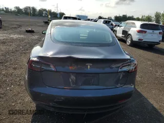 2023 Tesla Model 3 with VIN 5YJ3E1EA8PF692428, listed as a Copart auction lot 64667414 with 16,704 mi miles and Salvage Title. Bid and sale history available at DreamBid. Image 6.