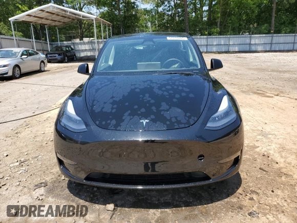 2024 Tesla Model Y z VIN 7SAYGDED2RA329802, wystawiony jako Copart lot #57748805 z przebiegiem 19 391 mil mil oraz Szkoda całkowita • Salvage title. Historia ofert i sprzedaży dostępna na DreamBid. Obrazek 5.