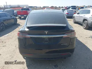 2019 Tesla Model X 75D with VIN 5YJXCBE22KF184504, listed as a IAAI auction lot 41802023 with 137,094 mi miles. Bid and sale history available at carsss.com. Image 16.