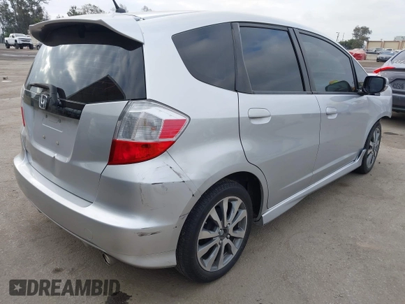 2013 Honda Fit Sport with VIN JHMGE8H58DC003021, listed as a IAAI auction lot 42120318 with 233,056 mi miles. Bid and sale history available at carsss.com. Image 4.