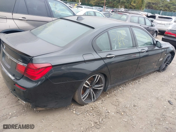 2015 BMW 7 Series 750i xDrive with VIN WBAYB6C57FD965802, listed as a IAAI auction lot 40588698 with 999,999 mi miles. Bid and sale history available at carsss.com. Image 4.