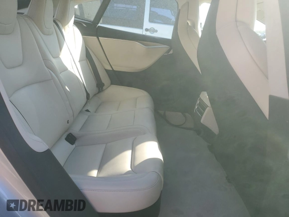 2017 Tesla Model S 100D z VIN 5YJSA1E2XHF213086, wystawiony jako Copart lot #53780875 z przebiegiem 34 205 mil mil oraz Szkoda całkowita • Salvage title. Historia ofert i sprzedaży dostępna na DreamBid. Obrazek 10.