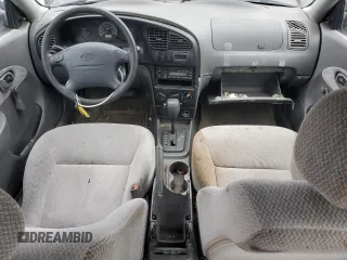 2003 Kia Spectra with VIN KNAFB121235248271, listed as a Copart auction lot 82426614 with 151,347 mi miles and Salvage Title. Bid and sale history available at DreamBid. Image 8.
