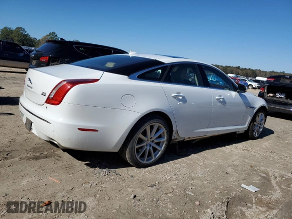 2013 Jaguar XJ z VIN SAJWJ1CD3D8V48059, wystawiony jako Copart lot #88537745 z przebiegiem 139 706 mil mil oraz Szkoda całkowita • Salvage title. Historia ofert i sprzedaży dostępna na DreamBid. Obrazek 3.