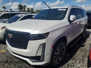 2021 Cadillac Escalade Sport z VIN 1GYS3EKL1MR270077, wystawiony jako Copart lot #74130854 z przebiegiem 21 584 mil mil oraz Szkoda całkowita • Salvage title. Historia ofert i sprzedaży dostępna na DreamBid. Obrazek 1.