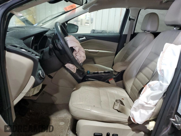 2015 Ford Escape Titanium with VIN 1FMCU9J93FUC86300, listed as a Copart auction lot 60852895 with 156,296 mi miles and Salvage title. Bid and sale history available at DreamBid. Image 7.