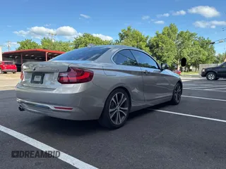 2015 BMW 2 Series 228i with VIN WBA1F5C59FV257027, listed as a Copart auction lot 62222855 with 113,383 mi miles and Clean title. Bid and sale history available at DreamBid. Image 4.