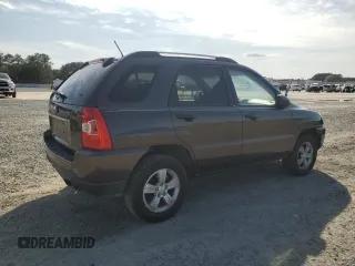 2009 Kia Sportage LX with VIN KNDJF724297573255, listed as a Copart auction lot 51300095 with 199,362 mi miles and Salvage Title. Bid and sale history available at carsss.com. Image 3.
