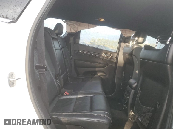 2014 Jeep Grand Cherokee Limited z VIN 1C4RJFBG8EC129868, wystawiony jako Copart lot #86781534 z przebiegiem 99 316 mil mil oraz Szkoda całkowita • Salvage title. Historia ofert i sprzedaży dostępna na DreamBid. Obrazek 11.